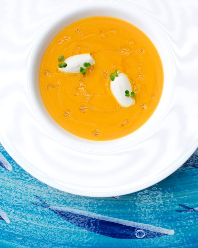 yellow liquid in white ceramic bowl