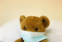 암 면역 요법: 최신 치료법과 그 효과 brown bear plush toy on white textile