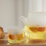 “바쁜 일상 속 건강 챙기기, 작은 습관이 만드는 큰 변화” clear glass pitcher with yellow liquid